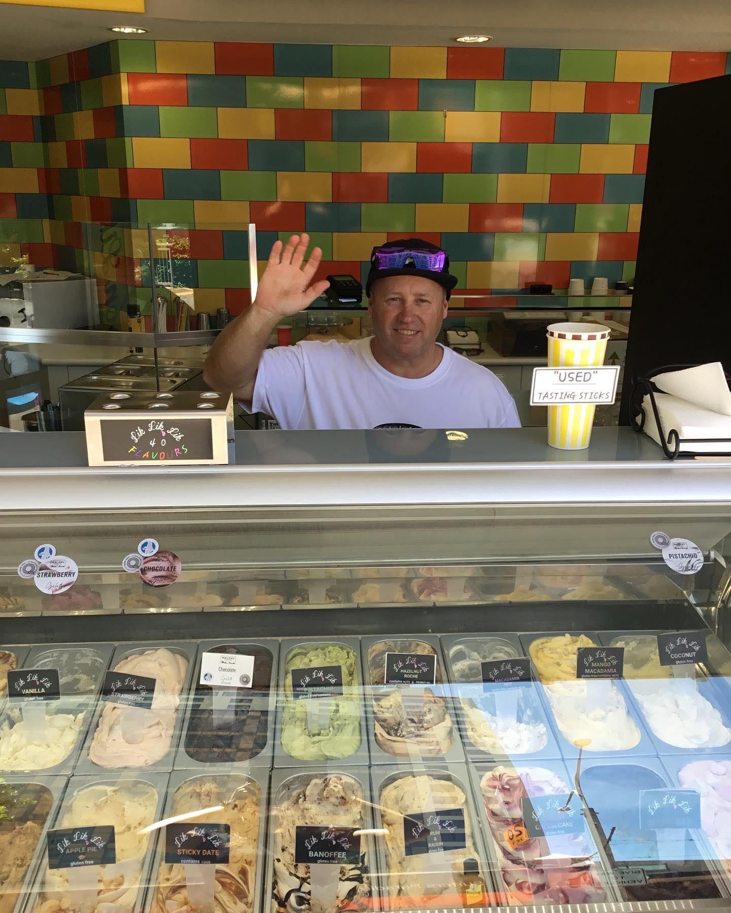 Churros with gelato and chocolate sauce served in a catering tray
